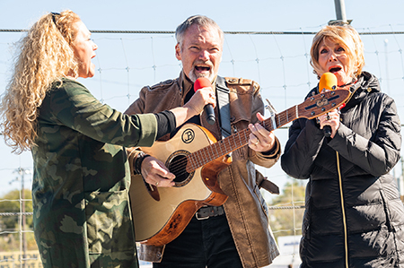 Jeannie Seely & John Berry sing National Anthem at 36th All American 400 Race Finale Weekend